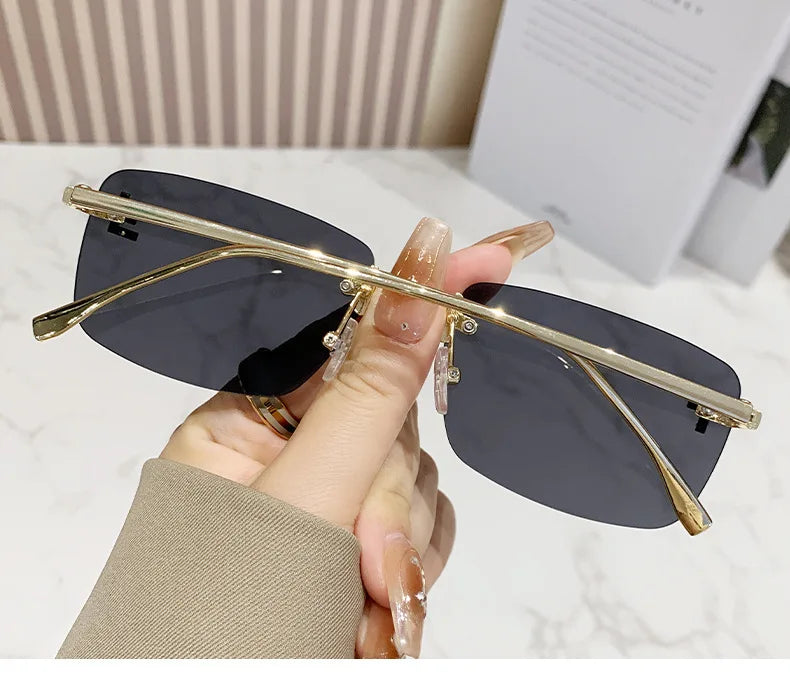 Ruiao rimless sunglasses UV400 fashion square metal glasses for women luxury brand designer diamond y2k small face sun glasses